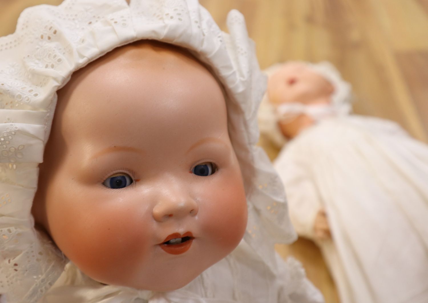 Two Armand Marseille bisque headed dolls and a similar Japanese geisha doll